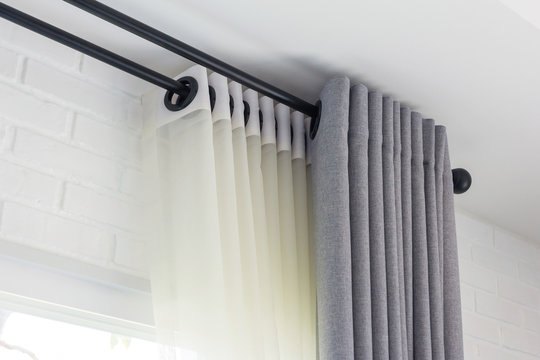Curtain rings sliding loose off their rod